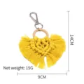 Handmade woven heart keychain with tassels and wooden ring in bright yellow color - Yellow