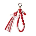 Handcrafted red and white braided cotton rope keychain with tassel flower and lucky cat charm - 20cm / Red