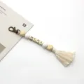 Handmade bohemian MAMA wooden bead keychain with cream tassel and bronze clasp - 20cm / White Pearl