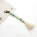 Bohemian wooden beaded keychain with 'MAMA' lettering and white cotton tassel - 20cm / Green Beads