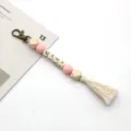 Handmade Boho MAMA keychain featuring macaron silicone beads and white cotton tassel - 20cm / Pink Bead