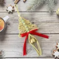 Handmade yellow and green macrame Christmas tree ornament with a red ribbon and bell - 30cm/11cm / Yellow