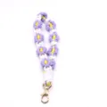 Handmade purple and yellow braided daisy floral wrist strap with a gold lobster clasp - 22*4cm / Purple