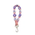 Handmade bohemian woven daisy flower wrist strap with a gold clasp for phone or keys - Purple White Pink