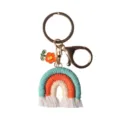 Handmade macramé rainbow keychain with orange flower charm and white fringe tassels - 3.93in*1.57in / Light Blue
