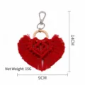 Handmade red macrame heart keychain with tassel and wooden ring, 14x9cm size - Red