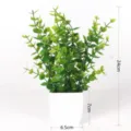 Artificial eucalyptus plant detail view, plastic potted green plant, measuring 24cm tall. - Medium Eucalyptus Potted Plant