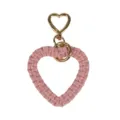 Handmade pink braided macramé heart keychain charm with gold-toned heart-shaped carabiner - 11cm x 7cm / Lotus root pink
