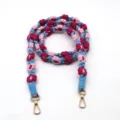 Handmade Bohemian braided daisy flower phone lanyard strap in pink and blue colors - Moon Blue and Rose Red