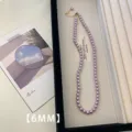 Dettaglio collana perle lavanda 6mm su vassoio gioielli - Collana (A79) / 6mm / Viola