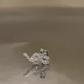 Elegant sparkling silver snake shaped cartilage stud earring with green gemstone eyes - Small Snake (A47)