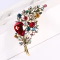 Detailed view of a vintage crystal bouquet brooch with vibrant colorful rhinestones. - Colorful