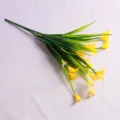 Detailed view of artificial yellow calla lilies with 5 prongs and green leaves for decor - Yellow