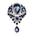 Elegant vintage brooch with deep blue crystals and teardrop pendant on white background - White Gold Plated Ink Blue