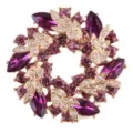 Elegante Vintage-Brosche in Bauhinia-Form mit lila Strasssteinen auf Goldbasis - Kaffee