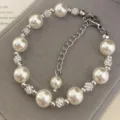 Elegant white pearl and sparkling zircon bead bracelet with adjustable chain for women - Artificial Pearl Bracelet (R1443) / White
