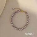 Elegant purple 6mm pearl bracelet with gold clasp and adjustable extender chain link - Bracelet / 6mm / Purple