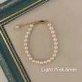 Elegant 6mm light pink pearl bracelet with gold lobster clasp for women. - Bracelet / 6mm / Pale Pink
