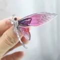 Close-up of translucent purple acrylic dragonfly brooch with sparkling silver rhinestones - Purple-Pink Gradient Dragonfly Brooch / Purple Pink