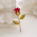 Close-up view of vintage red rose brooch featuring detailed gold leaves and stem - Vintage Red Rose (BH06)