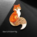 Squisita spilla a forma di volpe in smalto arancione vivace con coda di strass luccicanti - Giallo