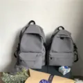 Minimalist grey water-resistant nylon backpacks in two sizes for students and couples - L / Gray