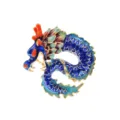 Macro close-up detail of a blue enamel Chinese zodiac dragon brooch with gold accents - Blue