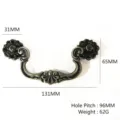 Vintage bronze cabinet pull dimensions: 131mm width, 65mm height, and 96mm hole spacing. - European Carved Handle (LS549)