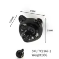 Detailed view of black ceramic bear head drawer handle showing 31x32mm dimensions and SKU - Black