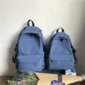 Lightweight blue nylon school backpack with water-resistant fabric for students and couples - Blue