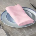Elegant pink satin cloth napkin for table setting, wedding, hotel, and restaurant use. - Peach Pink