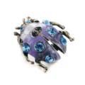 Close-up detail of vintage ladybug brooch featuring blue rhinestones and purple enamel. - Purple Ladybug (k3-4-2359)
