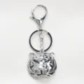 Vintage silver-toned rhinestone tiger head keychain with green crystal eyes for bag charm - Silver