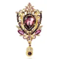 Elegante spilla floreale in oro vintage con un grande cristallo viola sfaccettato a goccia - Viola