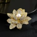 Luxury gold-plated lotus-shaped flower brooch with pavé crystals and central white pearl. - Gold Lotus White Pearl Center