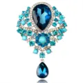 Luxurious silver-tone brooch featuring vibrant blue crystals and a teardrop pendant - Mixed Blue