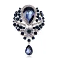 Luxury silver brooch featuring dark blue teardrop glass and dangling pendant charm - Navy Blue
