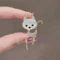 Elegant gold cat brooch pin featuring a white opal head and crystal-paved crown - Crown Artificial Opal Cat Style (Style 25)