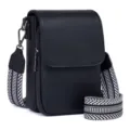 Detailed view of black PU leather crossbody phone bag with patterned wide strap. - Black