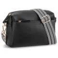 Close-up of black small crossbody bag featuring triple zippers and a patterned strap - Black