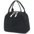 Detailed view of a black corduroy insulated lunch bag with secure dual handles and zipper - Portable Lunch Bag / Black