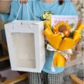 Handcrafted crochet sunflower bouquet with gift bag, ideal teacher day gift and durable decor. - Orange