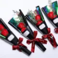 Rood boeket zeeprozen met bedankkaartje en rood Sweetlove-lint - Zwarte Basis Rood Lint