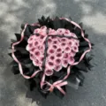 Heart-shaped pink rose soap flower bouquet with black wrapping and ribbon for Valentine gift. - 52 Flowers Yixiao Qingxin Bouquet Bucket / Plum Sauce