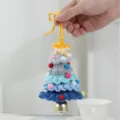 Handmade crochet Christmas tree hanging ornament with colorful pom poms and cute bell. - Gradient Blue