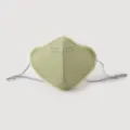 Detailed view of a light green velvet dustproof windproof mask with adjustable ear loops. - Matcha Green