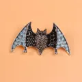 Macro view of a creative bat brooch featuring elegant black and light blue rhinestones - Silver Bat Style (Brooch 2) / Silver Base Blue Black Rhinestone Style (Brooch 2)