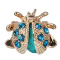 Cute golden beetle brooch featuring blue crystal rhinestones and a turquoise center stone - Blue Rhinestone Style
