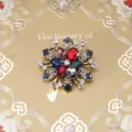 Vintage baroque style snowflake brooch featuring multi-color rhinestones on gold base - Antique Gold Multicolor Sunburst Snowflake (Style 23)