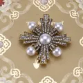 Vintage Baroque gold brooch with white pearls and crystals on a luxury gold background - Antique Gold Cross Starburst Pearl (Style 20)
